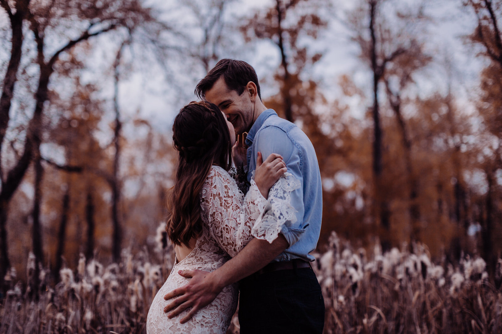 elopement photography of bride and groom holding each other and kissing